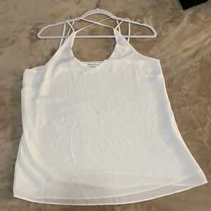 Blouse with crossing straps